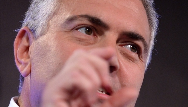 Treasurer Joe Hockey said it was time the ‘cashed up’ private sector started investing. AAP/Alan Porritt