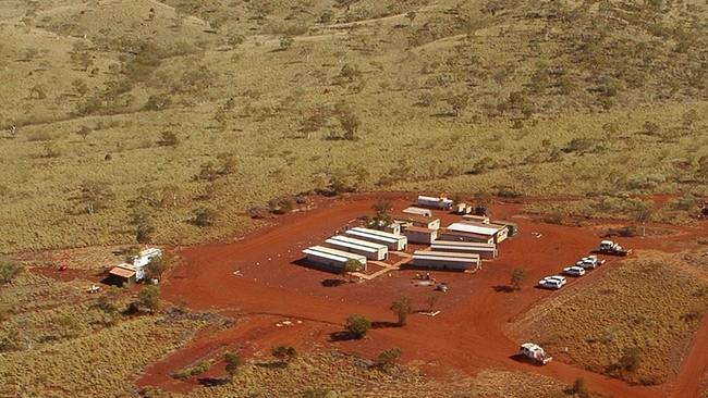 Workers fly in and out of mines like this one in the Pilbara, bringing financial security but anxiety to their local communities. AAP/Rebecca Le May