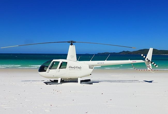 One&Only helicopter on Whitehaven Beach in the Whitsundays